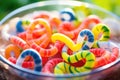 swirled gummy snakes in a rainbow coil Royalty Free Stock Photo