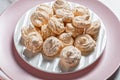 Swirled meringue cookies with caramelized walnuts of egg whites whipped with sugar Royalty Free Stock Photo