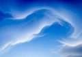 Swirling cloud formations against a deep blue sky create an abstract and ethereal visual Royalty Free Stock Photo