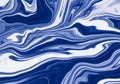 Swirling patterns of deep blue and white create a marbled effect, reminiscent of fluid dynamics or Royalty Free Stock Photo