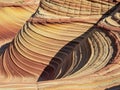 Swirling sandstone formations in desert landscape Royalty Free Stock Photo