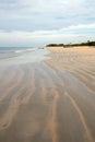 Swirling serpentine sand patterns on Nilaveli Beach in Trincomalee Sri Lanka