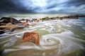 Swirling wave at Teluk Ketapang beach Royalty Free Stock Photo