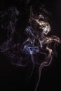 Rich swirls of smoke, black background Royalty Free Stock Photo