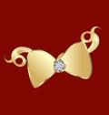 Swirly gold ribbon with diamond