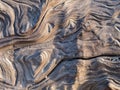 Swishy patterns on a weathered piece of driftwood