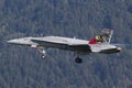 Swiss Air Force F-18 Hornet landing in front of a mountain Royalty Free Stock Photo