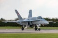 Swiss Air Force McDonnell Douglas F/A-18C Hornet Fighter aircraft J-5005 on the runway at RAF Waddington. Royalty Free Stock Photo