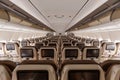 Swiss Airbus A340-300 airplane Economy Class cabin Zurich Airport in Switzerland Royalty Free Stock Photo