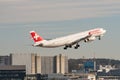 Swiss Airbus A340-313 plane departing from Zurich in Switzerland Royalty Free Stock Photo