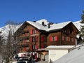 Swiss alpine holiday homes, mountain villas and holiday apartments in the winter ambience of the winter resort of Arosa
