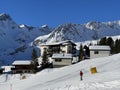 Swiss alpine holiday homes, mountain villas and holiday apartments in the winter ambience of the winter resort of Arosa