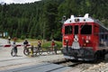 Swiss Alps: Bikers and hikers at the train station Morteratsch i