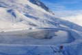 Swiss alps: Frozen lake for snow farming at Rothorn in Lenzerheide