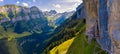 Swiss Alps and a restaurant under a cliff on mountain Ebenalp in Switzerland Royalty Free Stock Photo