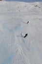 Swiss alps: Skiing on artificial snow at Parsenn above Davos City where the WEF takes place Royalty Free Stock Photo