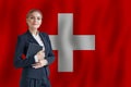 Swiss businesswoman on the flag of Switzerland digital nomad, business, startup concept