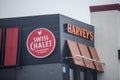 SWISS CHALET. HARVEYS RESTAURANT and Drive through. A Canadian restaurant specialized in burgers, sandwiches, wraps, poutines Royalty Free Stock Photo