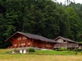 Swiss chalet in the mountains Royalty Free Stock Photo