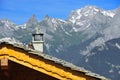 Swiss chalet roof with alps Royalty Free Stock Photo