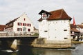 Swiss characteristic house and bridge over Reuss river in Bremgarten, Switzerland