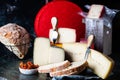 Swiss cheese belper knolle. Assortment of cheese. Cheese knife. Organic product. Black Pepper. italian appetizer.