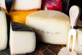 Swiss cheese belper knolle. Assortment of cheese. Cheese knife. Organic product. Black Pepper. italian appetizer.