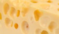 Swiss Cheese with Holes Close-Up Royalty Free Stock Photo