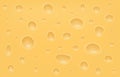 Swiss cheese texture, emmental or cheddar yellow background with air bubbles. Appetising switzerland milk, macro food