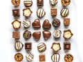 Chocolate pralines assortment on a white plate - top down view Royalty Free Stock Photo
