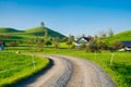 The Swiss countryside. Tree on top of the hill. Fields and pastures. Agricultural landscape in summer time. Royalty Free Stock Photo