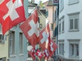 Swiss Flags in a Zurich street Royalty Free Stock Photo