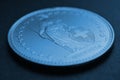 1 Swiss Franc coin close-up. Blue tinted background or wallpaper about economy, business or taxes. Money and Central Bank in Royalty Free Stock Photo