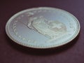 1 Swiss Franc coin close up. Purple tinted background or backdrop about economy, business or banking. Money and currency of Royalty Free Stock Photo