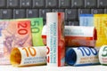 Swiss franc notes and a computer keyboard, CHF Royalty Free Stock Photo