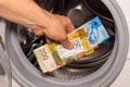 Swiss francs thrown into the washing machine, Concept, Money laundering, illegal activity, black market, Criminal activity Royalty Free Stock Photo