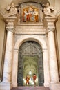 Swiss guards stand at the bronze door of the Apostolic Palace II