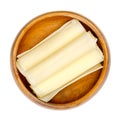 Swiss hard cheese rolls, rolled thin slices of Sbrinz, in wooden bowl Royalty Free Stock Photo