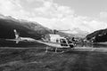 A Swiss Helicopter at glacier lake Silvaplana in the upper Engadin in canton GraubÃÂ¼nden