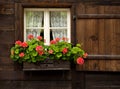 Swiss House with Flowerbox in Window Royalty Free Stock Photo