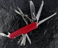 Swiss army knife with ruler added Royalty Free Stock Photo