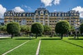 Swiss Montreux Palace hotel surrounded by lush greenery Royalty Free Stock Photo