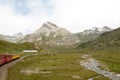 Swiss mountain train Bernina Express crossed through the high mo