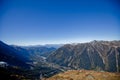 Vivid Sun in snowly mountains in Swiss near Geneva, blue sky, Eurone nature, stones and fresh air Royalty Free Stock Photo