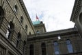 Swiss Parliament Building called Bundeshaus in Berne with swiss flag