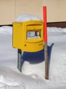Swiss Post box covered by snow