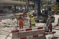 Swiss road construction workers working on the tram rails.