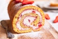 Swiss roll with strawberries and cream, homemde dessert