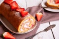 Swiss roll with strawberries and cream, homemde dessert