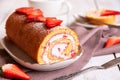 Swiss roll with strawberries and cream, homemde dessert Royalty Free Stock Photo